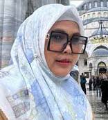 Hj. Dewi Nurlia